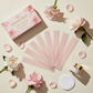 Glamour Touch Wax Strips flat lay with rose petals on cream background